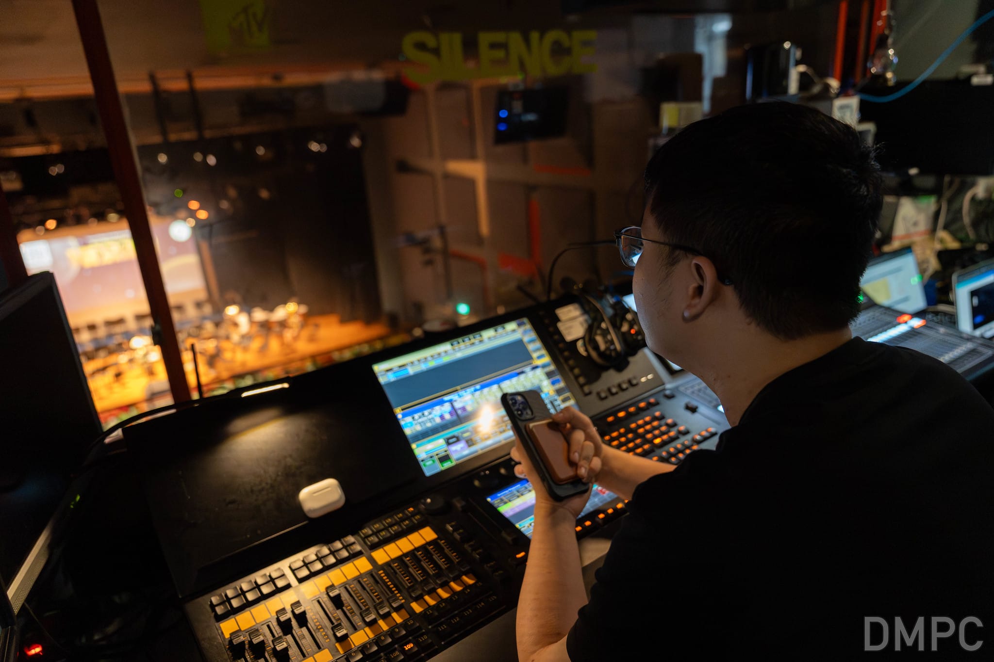 Image of Temasek Polytechnic DMPC working backstage at a concert